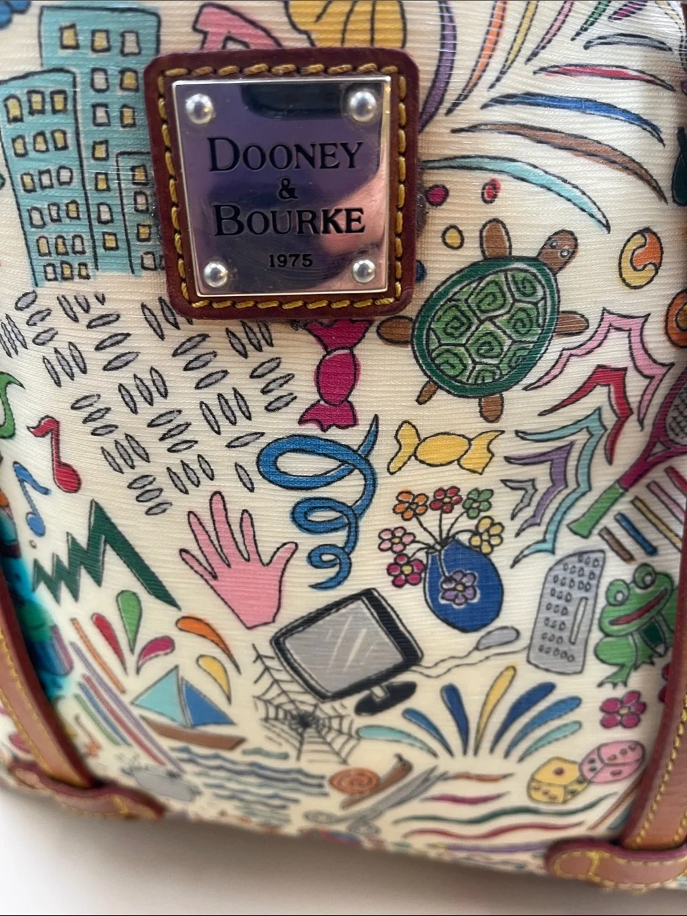 Dooney & Bourke playful doodle